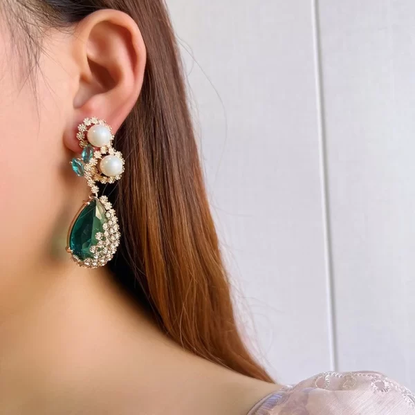 Aretes Curvos Circón Perlas
