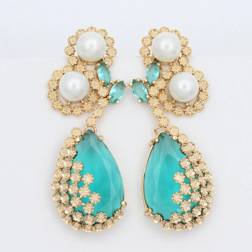 Aretes Curvos Circón Perlas