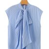 56ccb1c9-2c89-4816-ba6f-41dd13130387 Blusa rayitas de lazo celeste