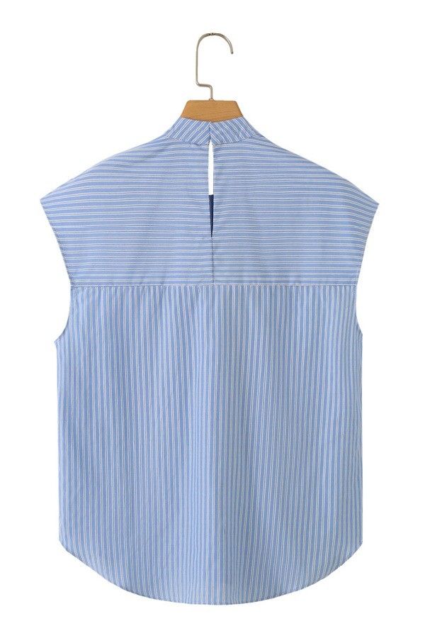 62f6e392-05c0-4ccd-a4f6-fae220c8a998 Blusa rayitas de lazo celeste